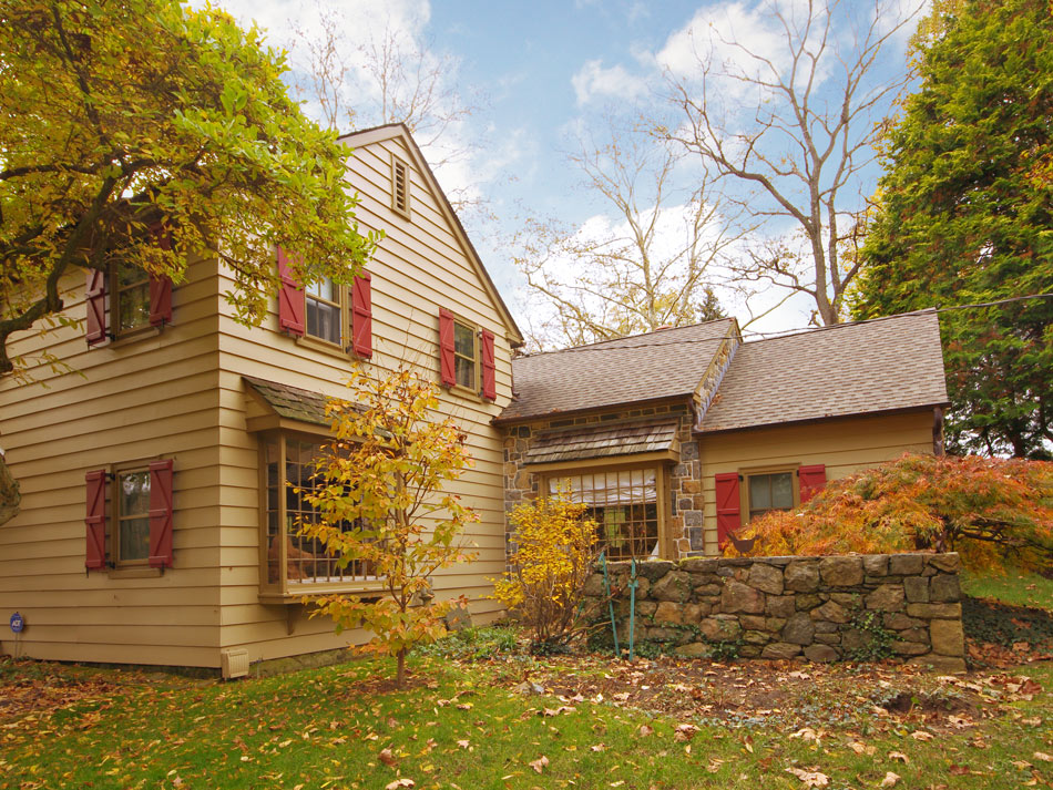 back of house with finished addition