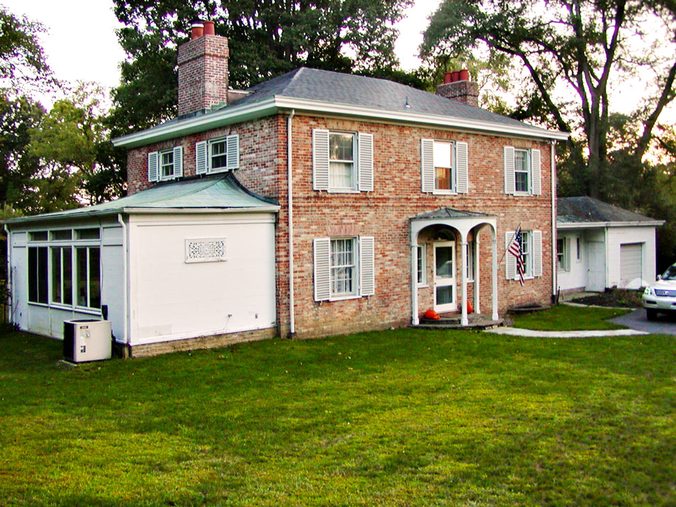 brick residence front view- before renovation