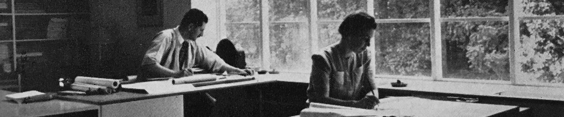 Victorine and Samuel Homsey working at their desks circa 1940's